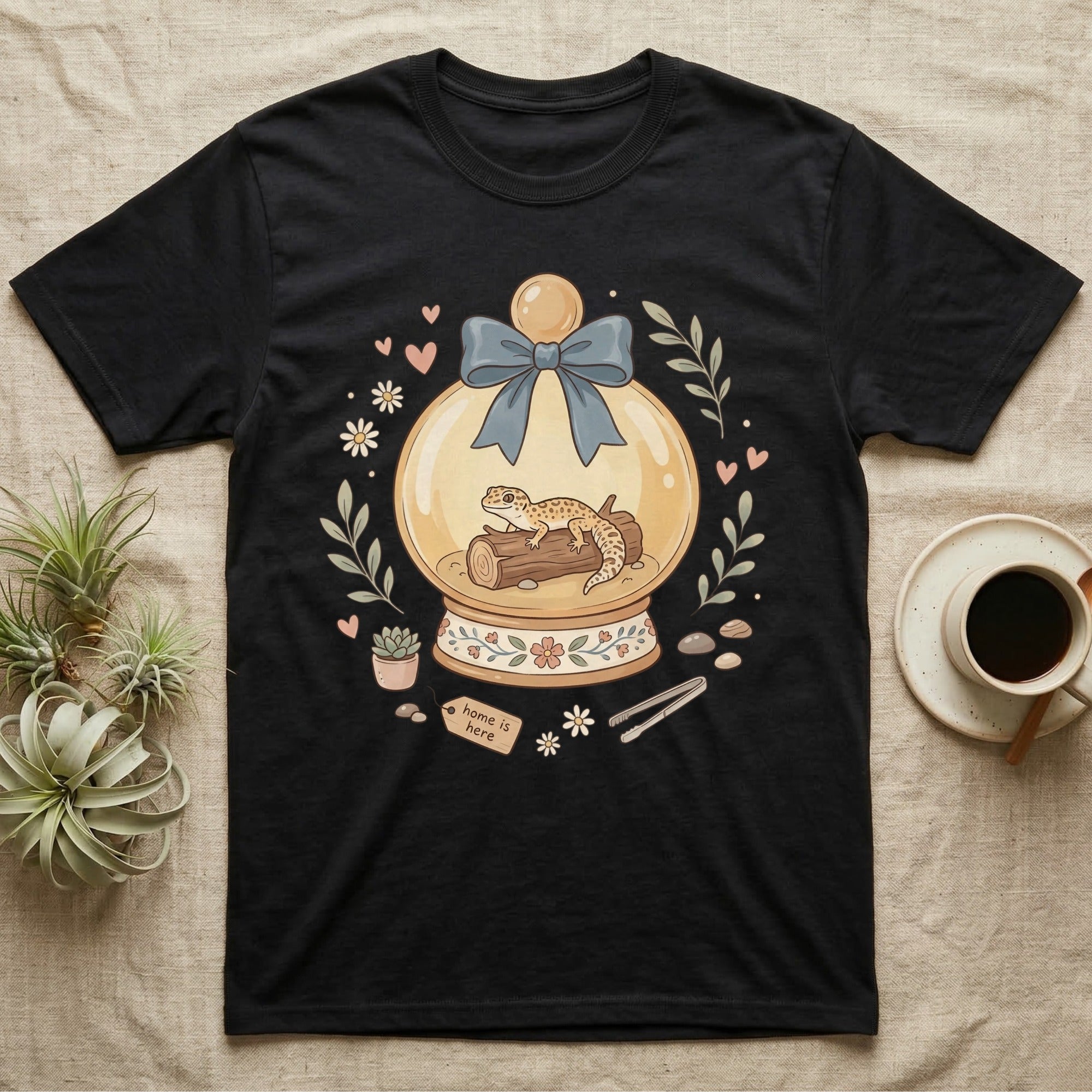 Black t-shirt featuring a leopard gecko inside a terrarium snow globe.