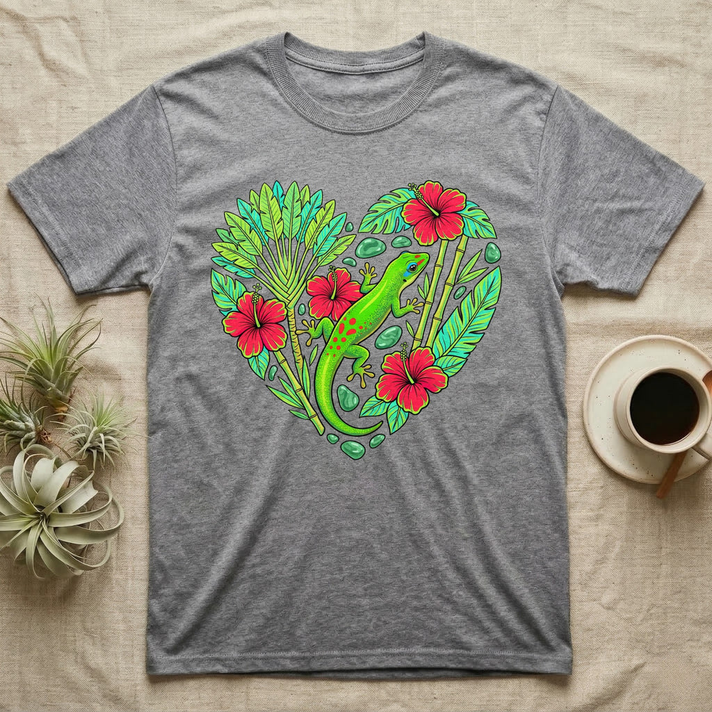 Grey t-shirt featuring a vibrant heart design with a green gecko, hibiscus flowers, and tropical leaves.