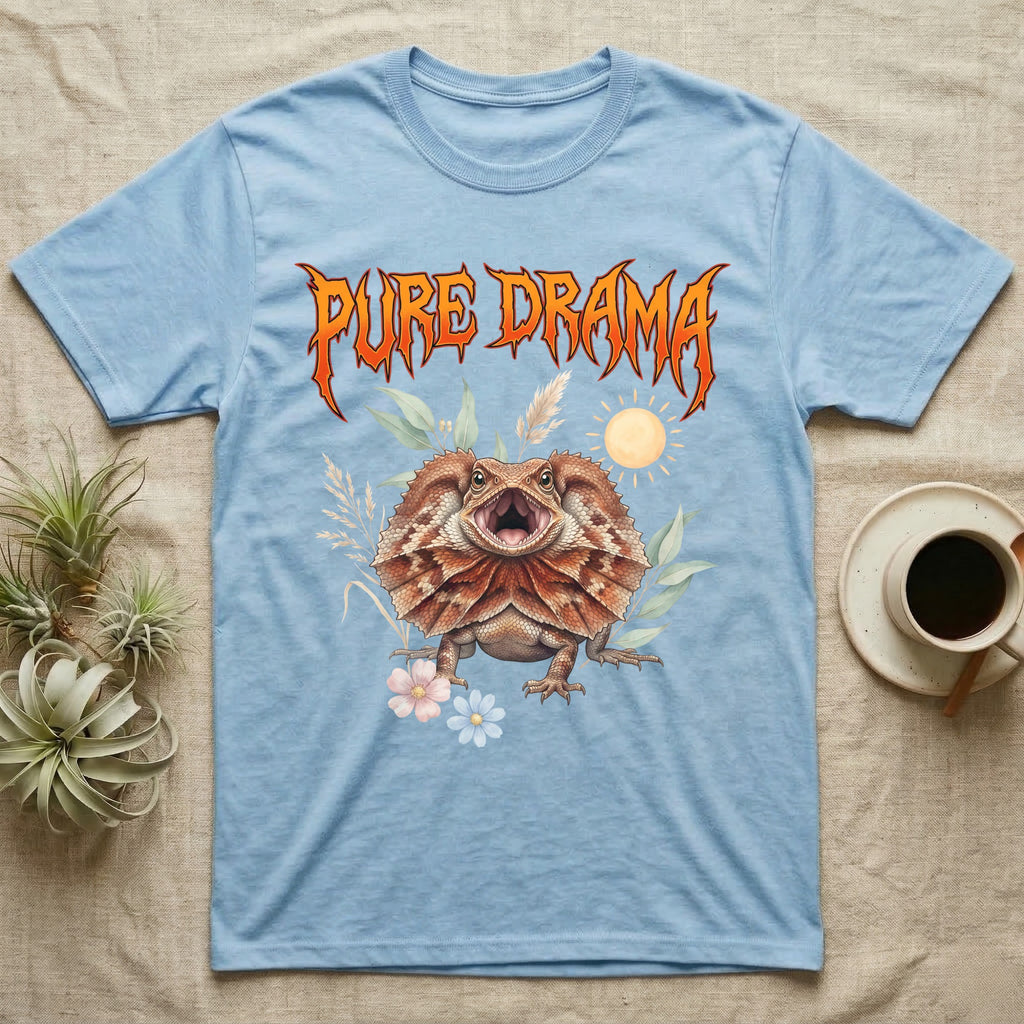 Frilled Dragon Feral T-Shirt in Light Blue — Frilled dragon with its neck frill flared and mouth gaping under a jagged fiery-orange metal "PURE DRAMA" wordmark.