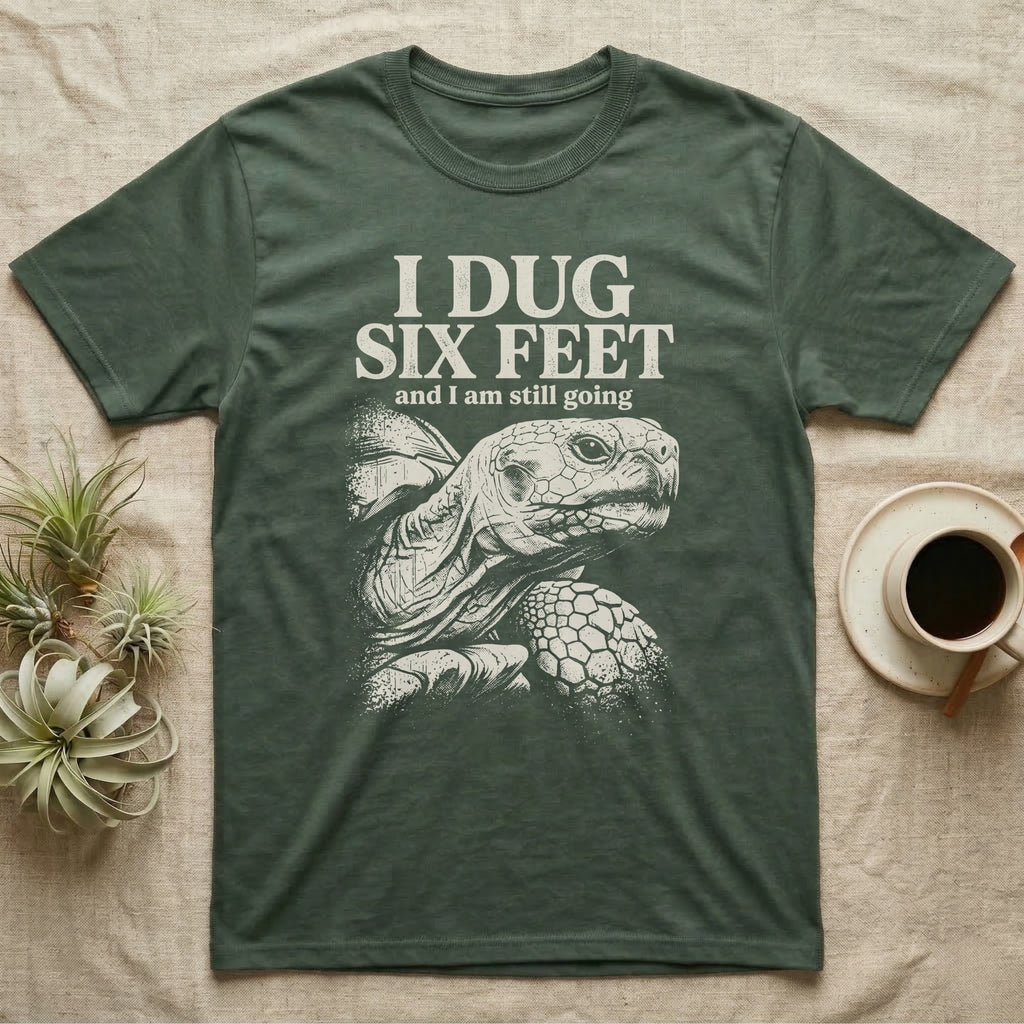Sulcata Tortoise Dug Six Feet T-Shirt in Military Green — One-ink white sulcata tortoise portrait on black under the words I DUG SIX FEET and I am still going.