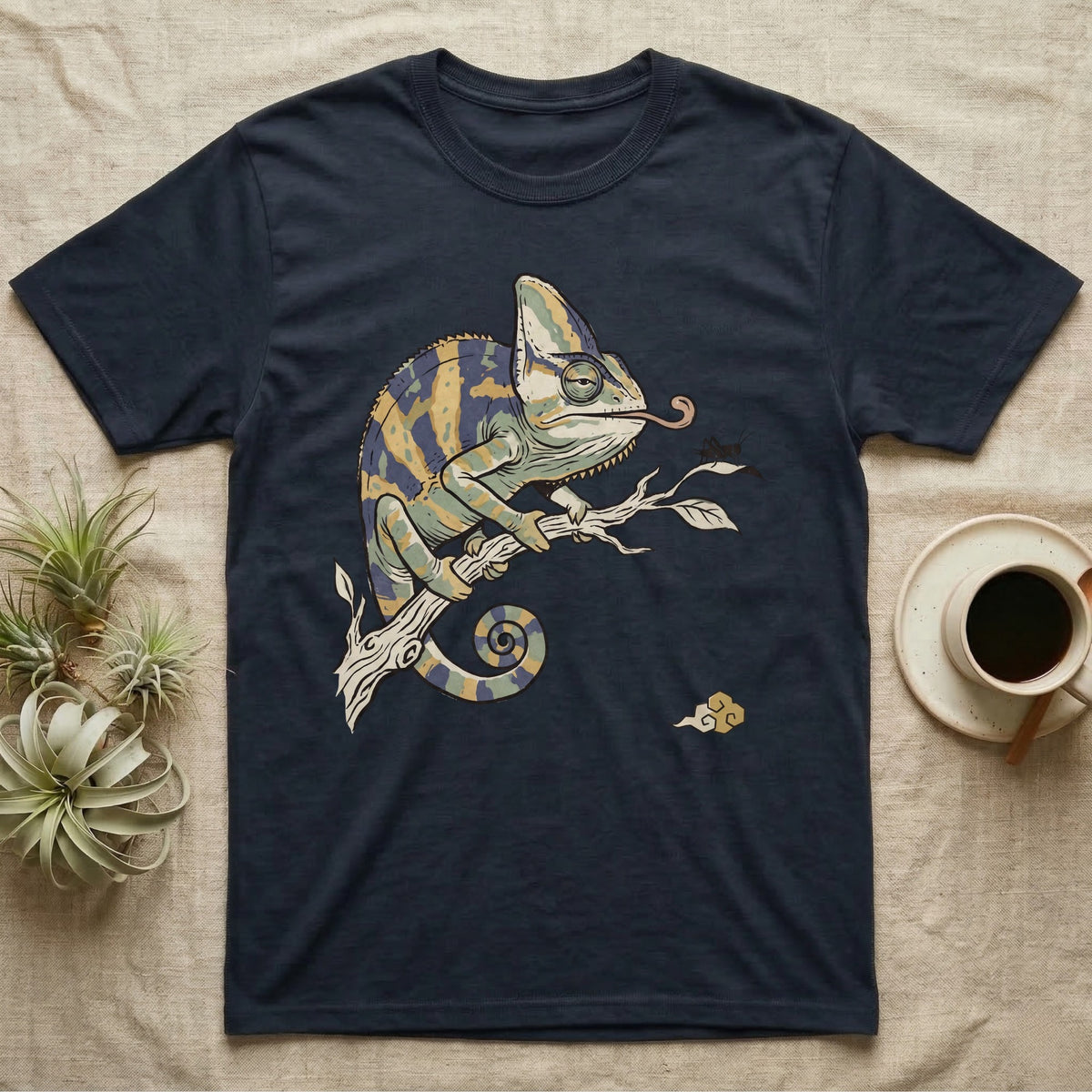 Veiled Chameleon Diet T-Shirt in Navy — Ukiyo-e woodblock illustration of a veiled chameleon extending its tongue, with a deadpan serif caption beneath the subject.