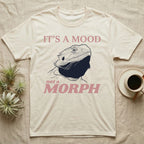 Bearded Dragon Black Mood T-Shirt in Natural — Engraved bearded dragon with a fully flared black beard, between the words It's A Mood and morph in dusty rose.