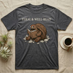 Red-Foot Tortoise Reading T-Shirt in Dark Heather — Pen-and-ink red-foot tortoise seated reading a book in tiny glasses with cross-hatch shading and cream ink