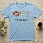 Milk Snake Shed T-Shirt in Light Blue — Glossy red, black and white milk snake with its tail still in its translucent shed skin above the words FRESH SHED, WHO DIS