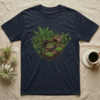 Pacman Frog Vivarium T-Shirt in Navy — Botanical illustration of a pacman frog thriving in a planted bioactive vivarium beside a small empty plastic cup.