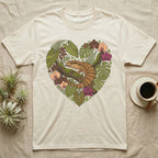 Cream t-shirt with a heart-shaped botanical illustration featuring a lizard.