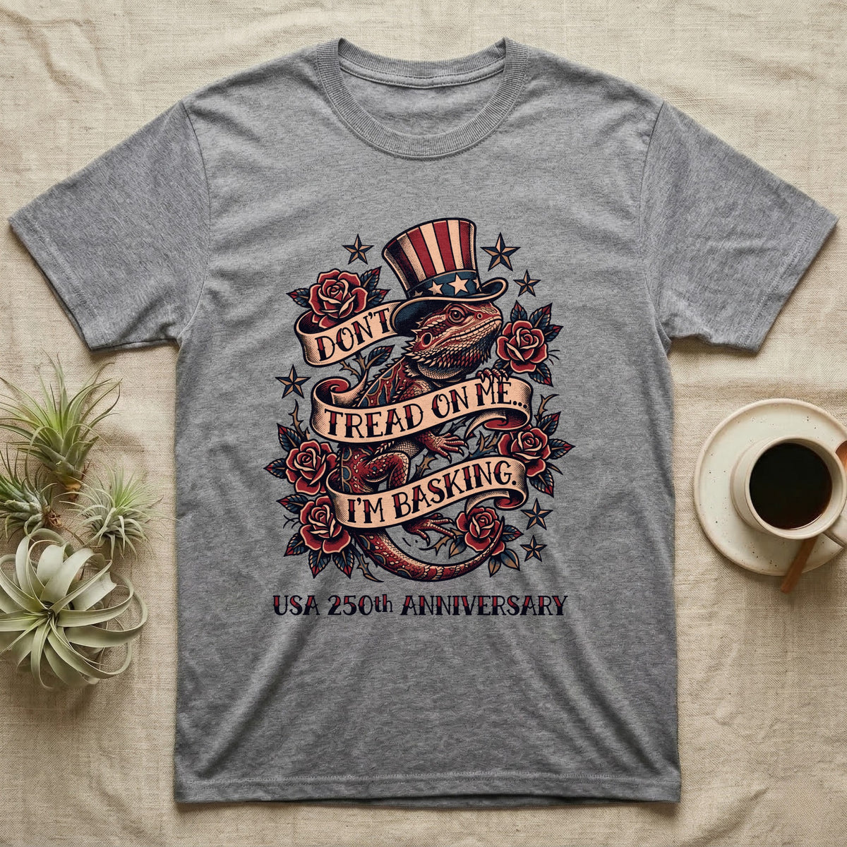 Bearded Dragon Tattoo T-Shirt in Sport Grey — Tattoo-flash bearded dragon in a star top hat among roses with banners reading Don't Tread On Me I'm Basking.