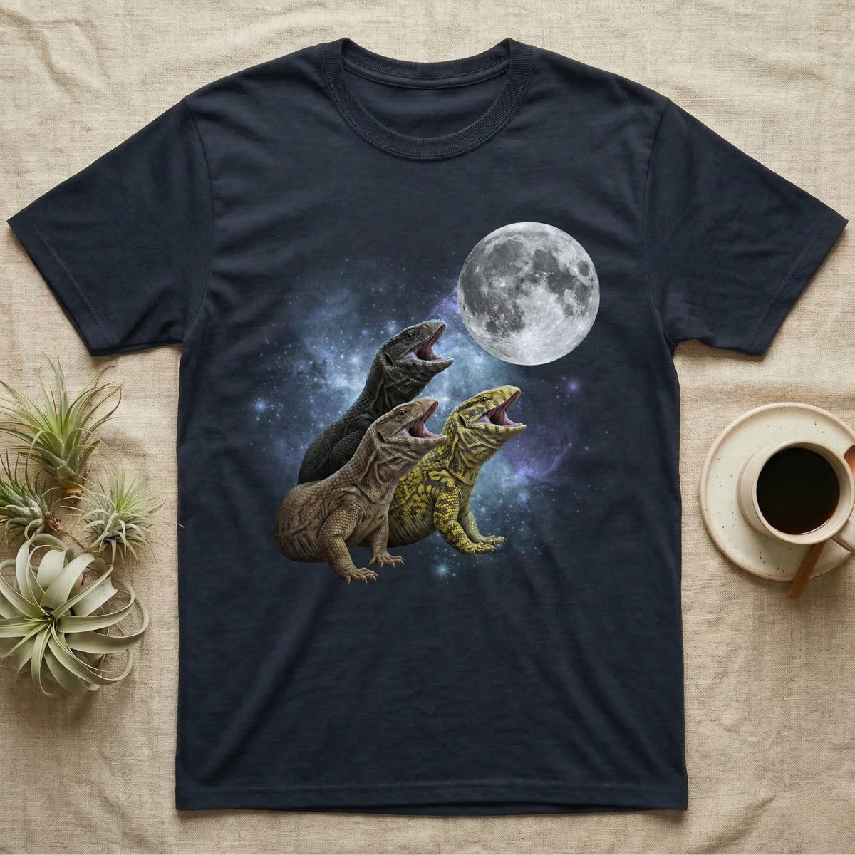 Savannah Monitor Moon Howl T-Shirt in Navy — Three Savannah Monitor colour morphs howling at a full moon over a nebula on a dark grey t-shirt.