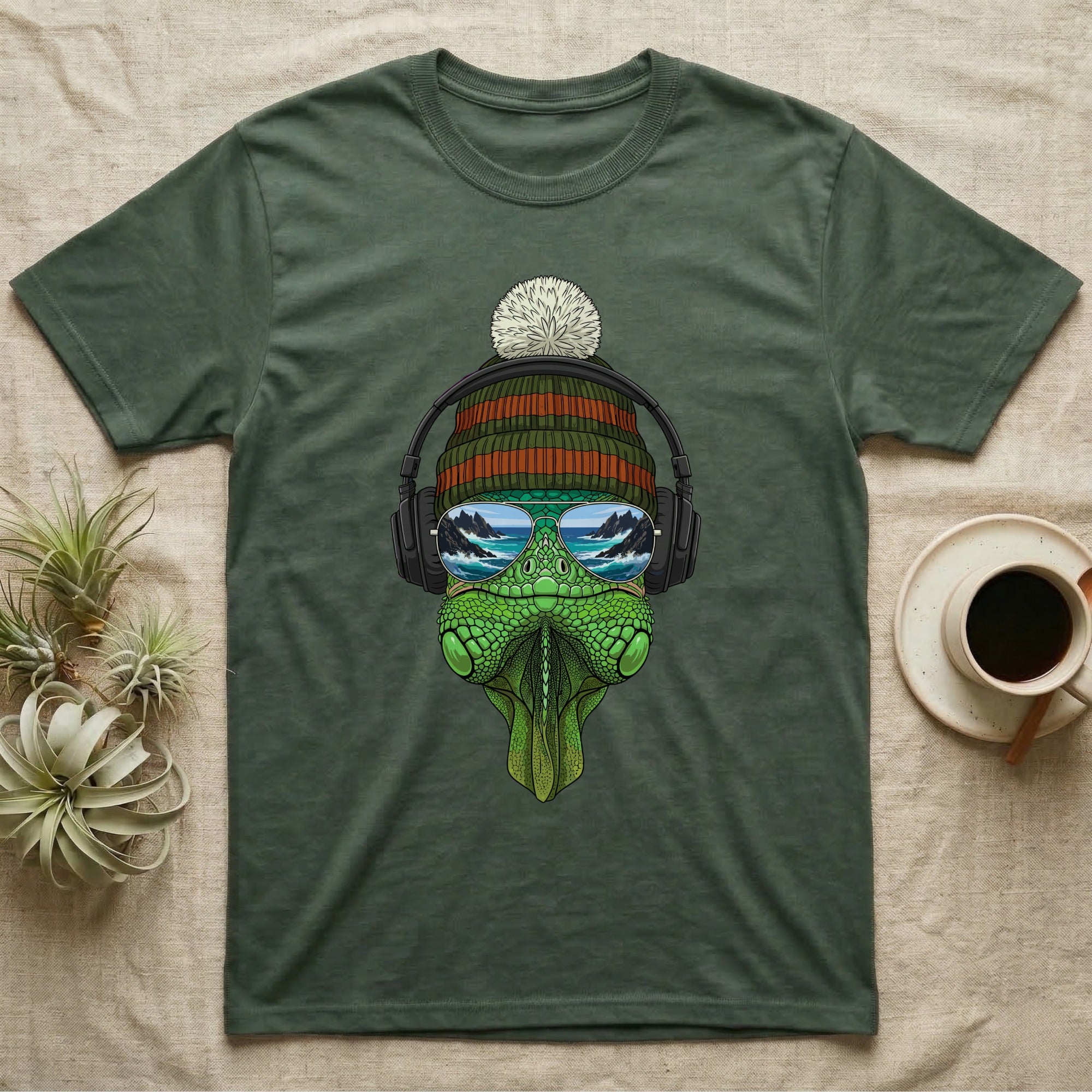 Green t-shirt with a cartoon alligator wearing sunglasses and headphones.