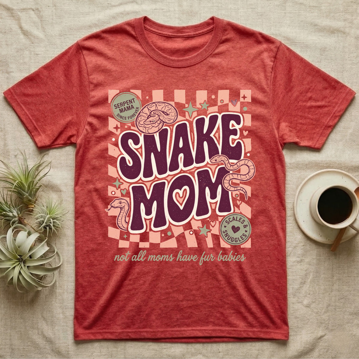 Red t-shirt with "Snake Mom" text and snake graphics.