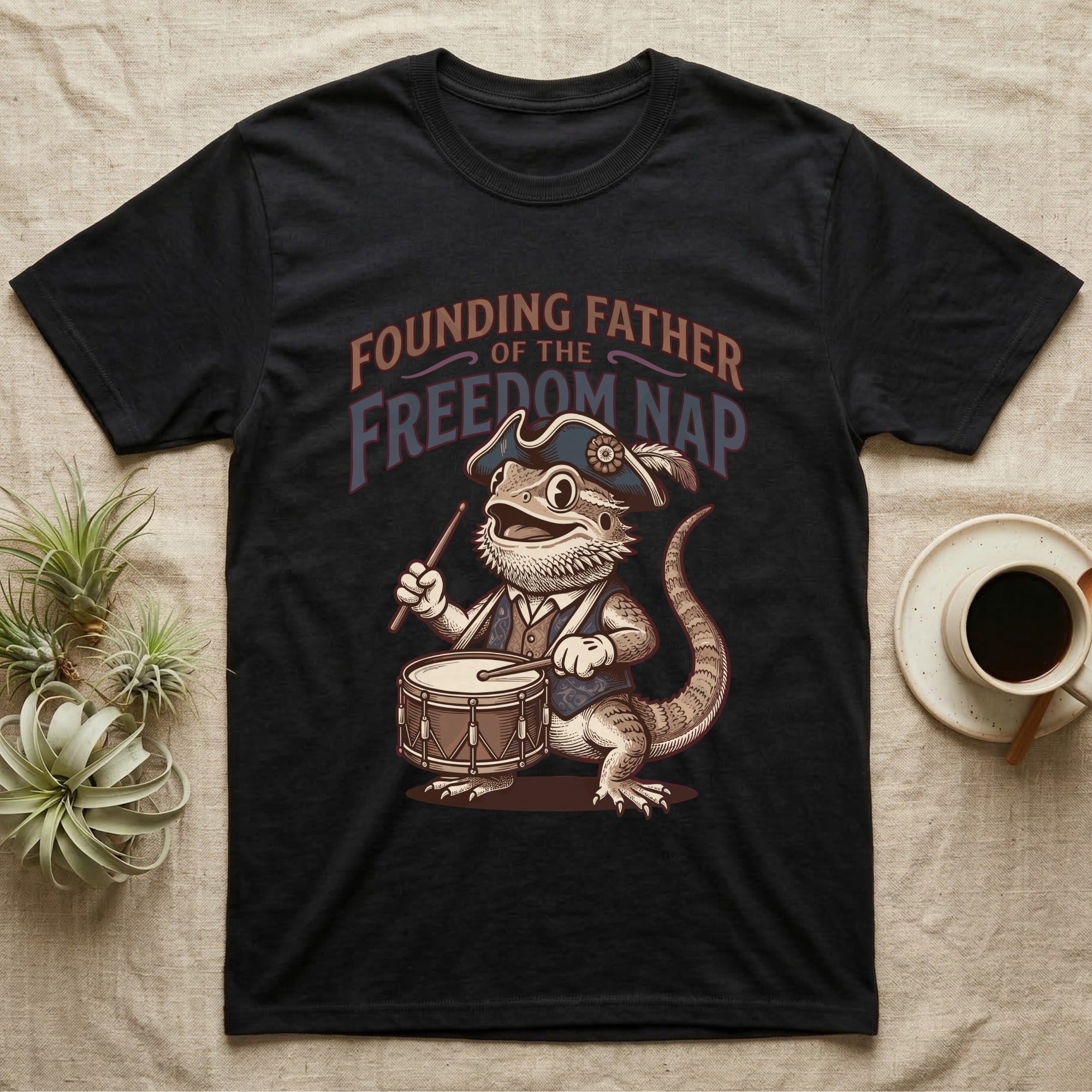 Bearded Dragon Drummer T-Shirt in Black — Sepia woodcut bearded dragon as a Revolutionary drummer boy under ornate text Founding Father of the Freedom Nap.