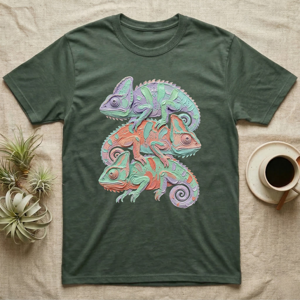 Green t-shirt with three stacked chameleons in purple, orange, and teal.