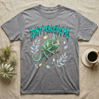 Veiled Chameleon Feral T-Shirt in Sport Grey — Veiled chameleon on a branch with swivelling eyes under a jagged turquoise metal "DON'T PERCEIVE ME" wordmark.