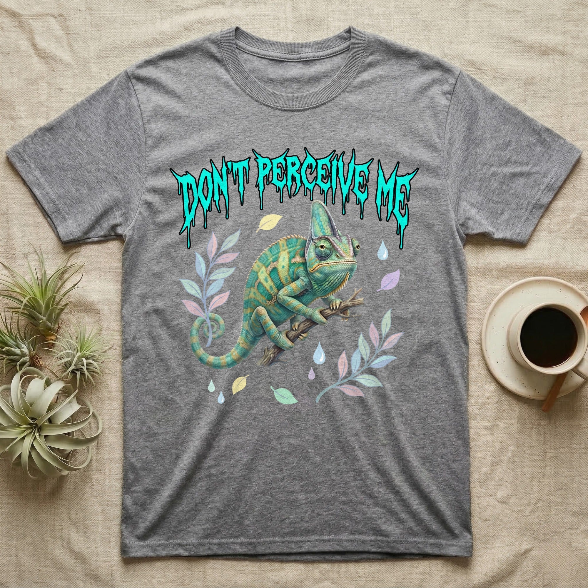 Veiled Chameleon Feral T-Shirt in Sport Grey — Veiled chameleon on a branch with swivelling eyes under a jagged turquoise metal "DON'T PERCEIVE ME" wordmark.
