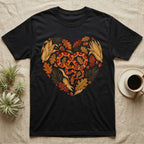 Black t-shirt with a heart design of fall leaves, acorns, and a snake.