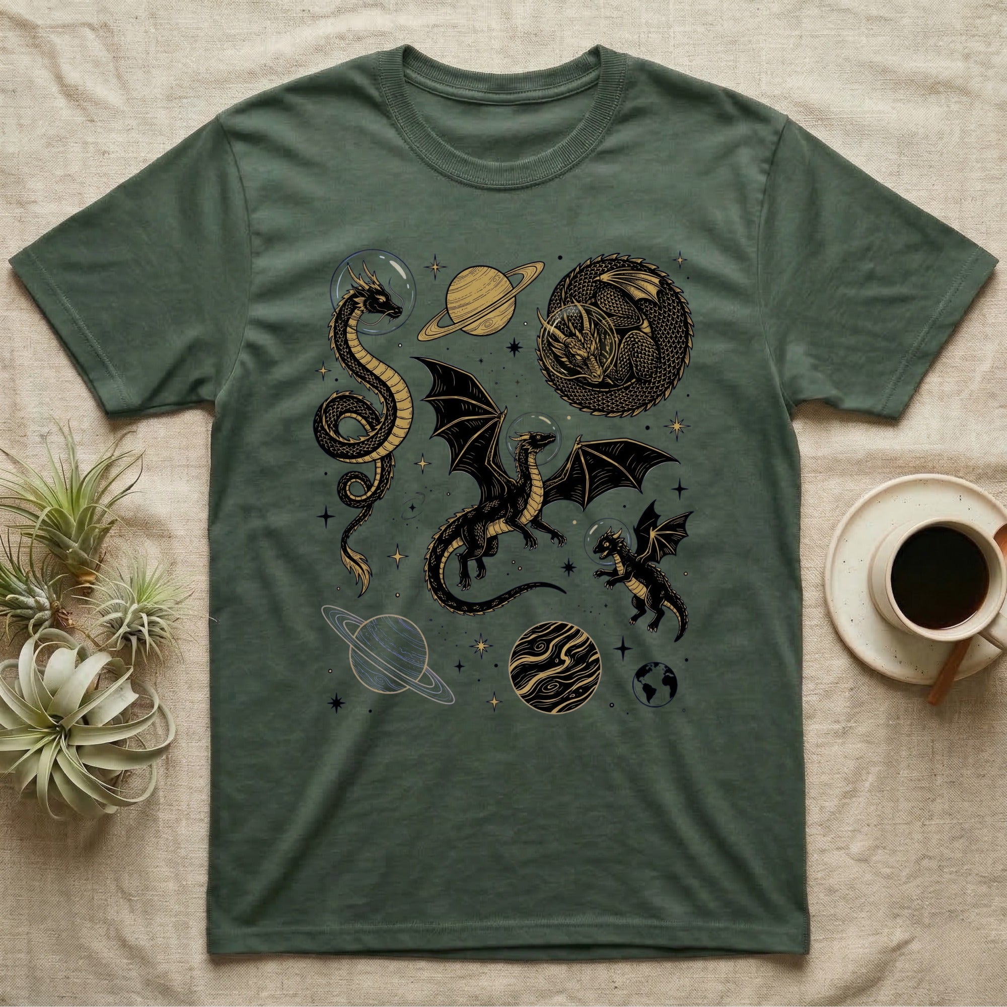 T-shirt with space dragons, planets, and stars design.