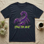 Dark t-shirt with a neon green and purple scorpion graphic and "STING THE BEAT" text.