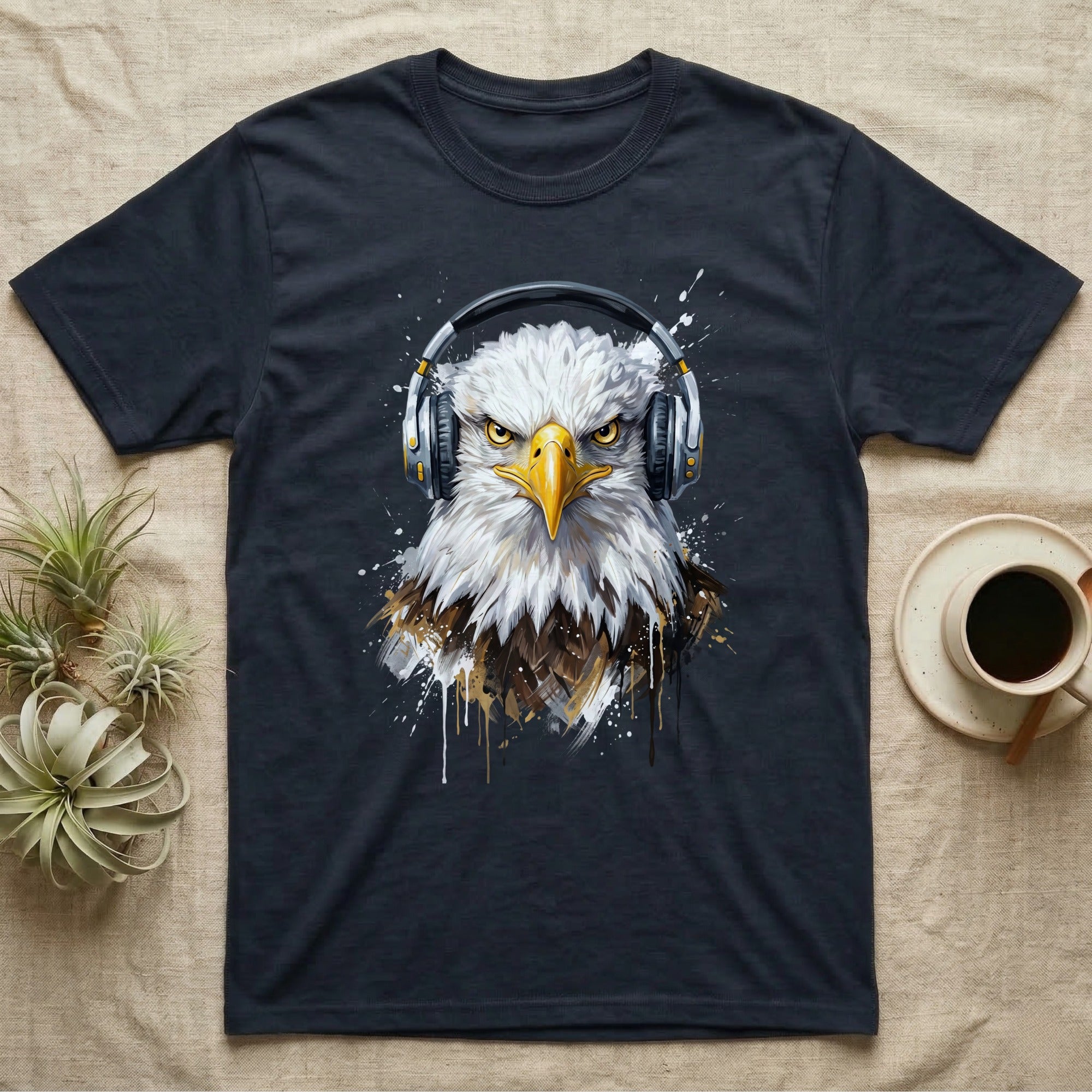 Bald eagle wearing headphones, printed on a dark t-shirt.