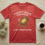 Red-Eared Slider Grudges T-Shirt in Heather Red — Engraved red-eared slider lounging in a camp chair with tea under I Don't Hold Grudges I Let Them Slide