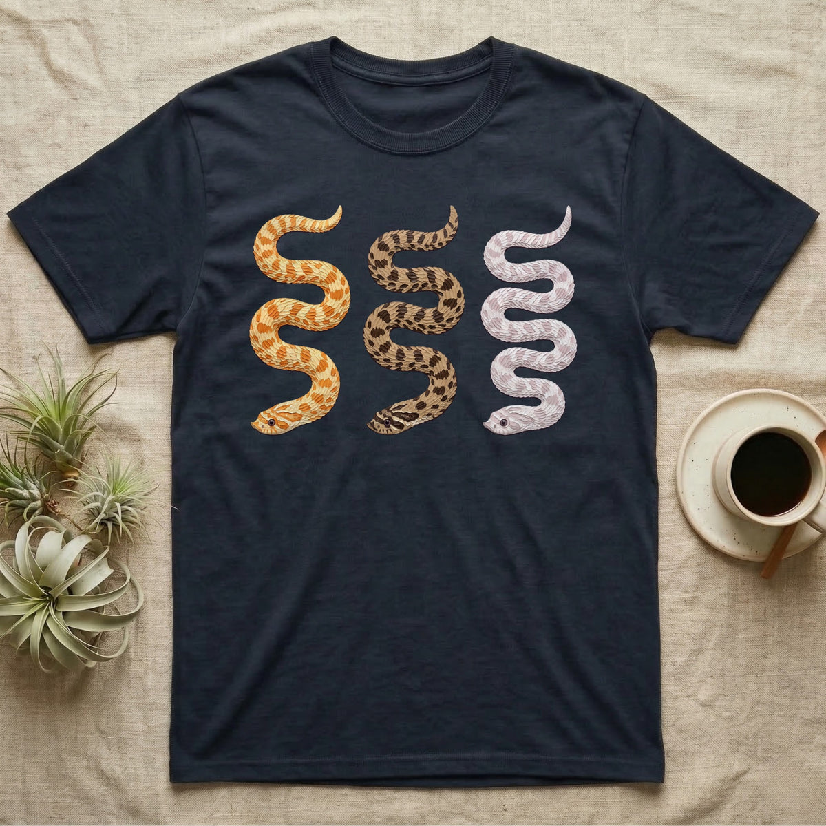 Hognose Morph Triptych T-Shirt in Navy — Palette-knife painting of three western hognose snakes side by side, albino, anaconda and snow morphs.