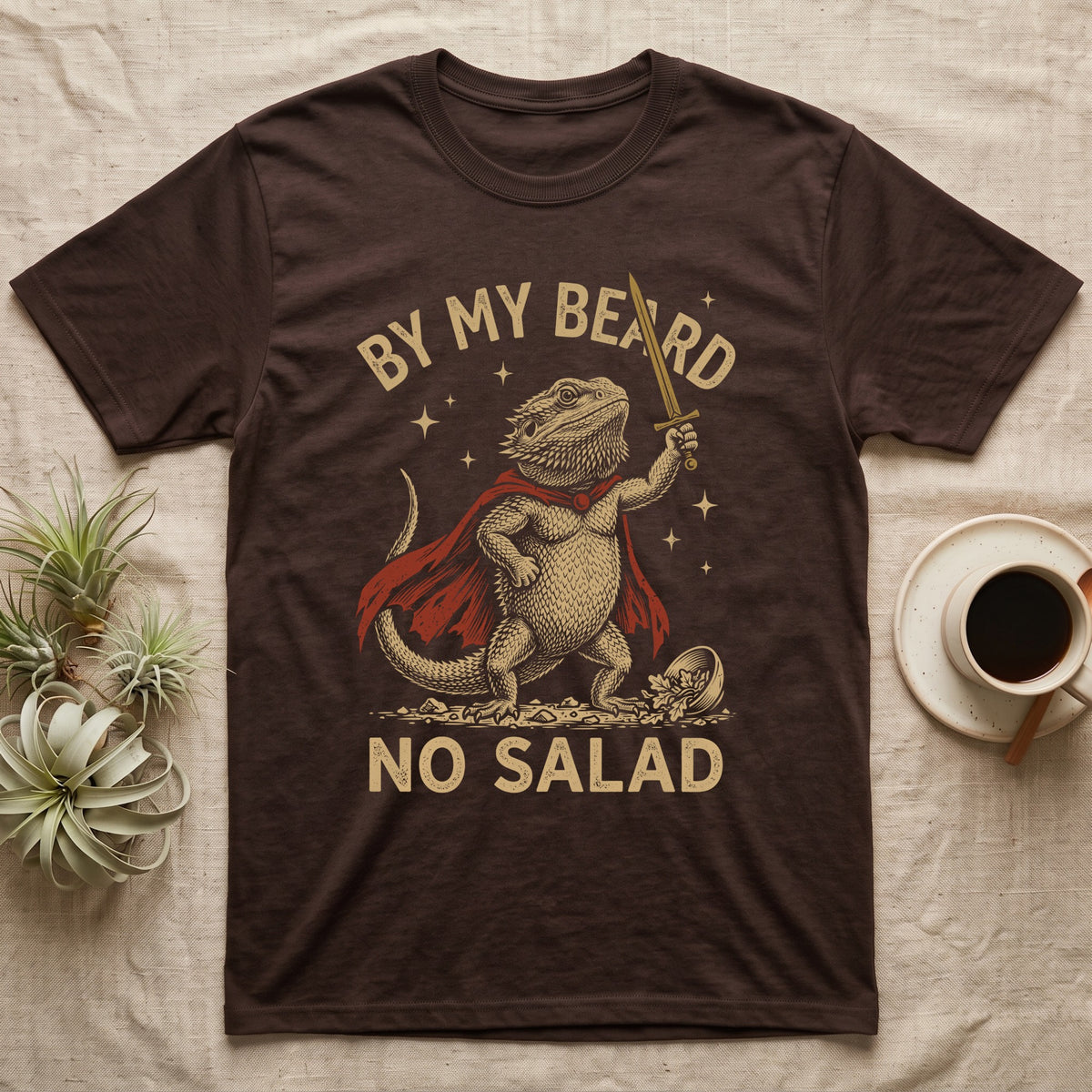 Bearded Dragon Knight T-Shirt in Dark Chocolate — Scratchboard bearded dragon knight with red cape and gold sword by a tipped salad bowl, lettered BY MY BEARD NO SALAD