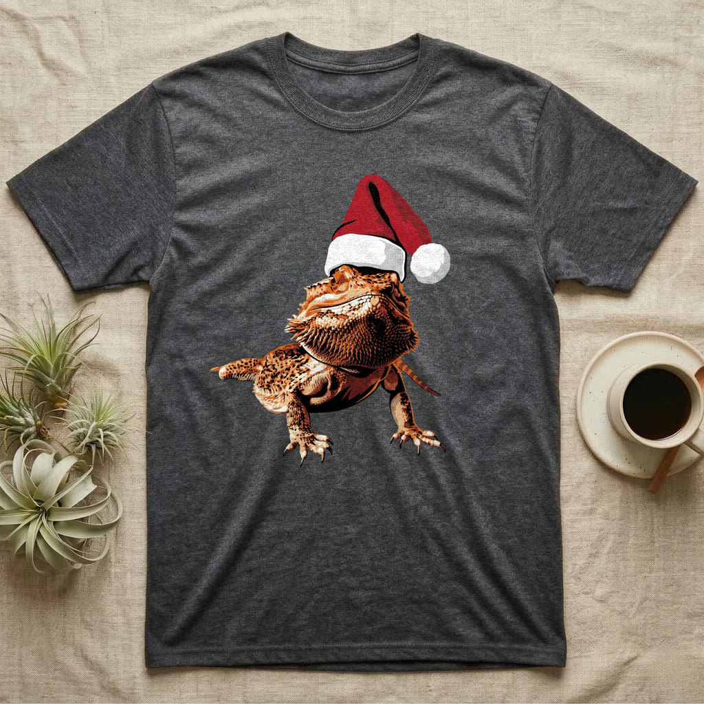 Vintage comic illustration of a bearded dragon wearing a red and white Santa hat, graphic-only, no text. — shown on a Dark Heather tee.