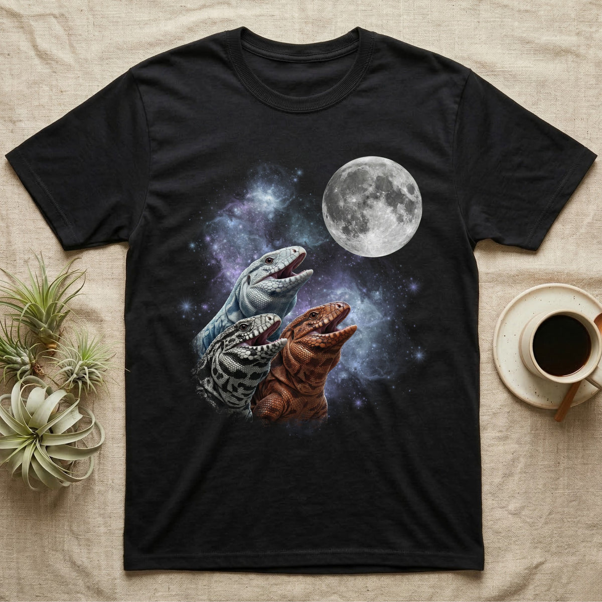 Tegu Moon Howl T-Shirt in Black — Three Tegu colour morphs howling at a full moon over a nebula on a dark grey t-shirt.