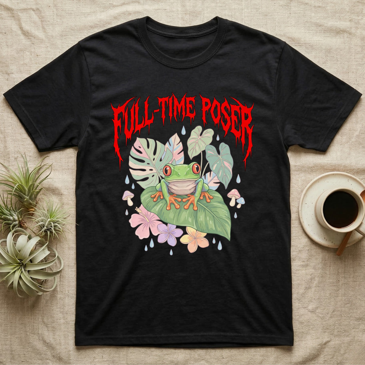 Red-Eyed Tree Frog Feral T-Shirt in Black — Red-eyed tree frog on a leaf in a pastel jungle scene under a spiky red metal wordmark reading FULL-TIME POSER.
