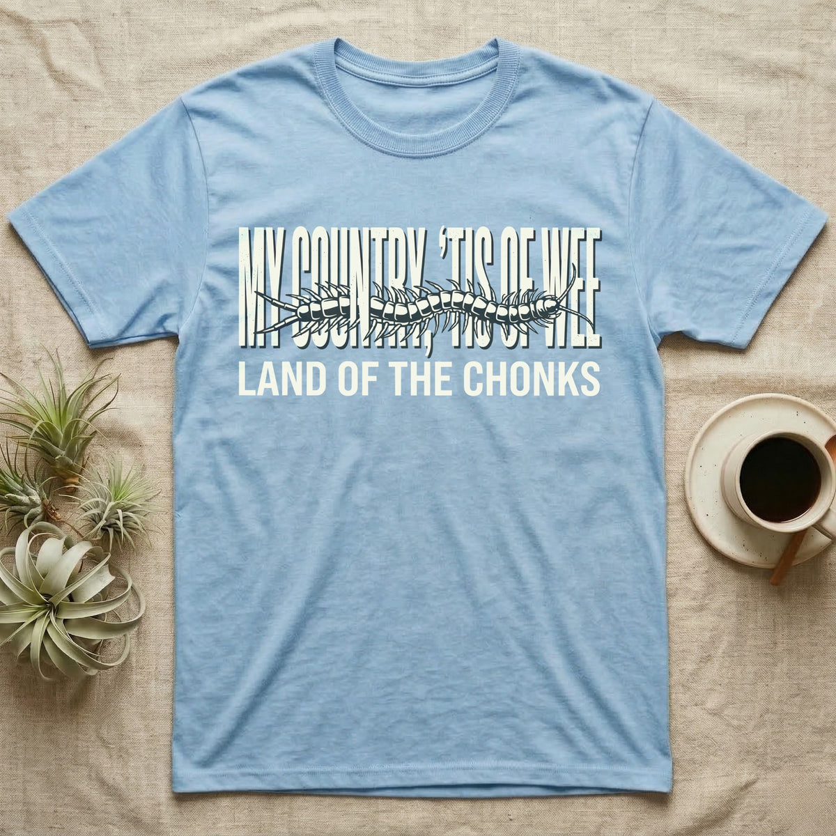 Centipede Land Of Chonks T-Shirt in Light Blue — Black-and-white woodcut centipede across distressed text reading My Country Tis of Wee, Land of the Chonks.