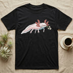 Axolotl Blossom T-Shirt in Black — Watercolor illustration of a pink leucistic axolotl with feathery gills holding an aquatic blossom sprig, on a dark grey t-shirt.