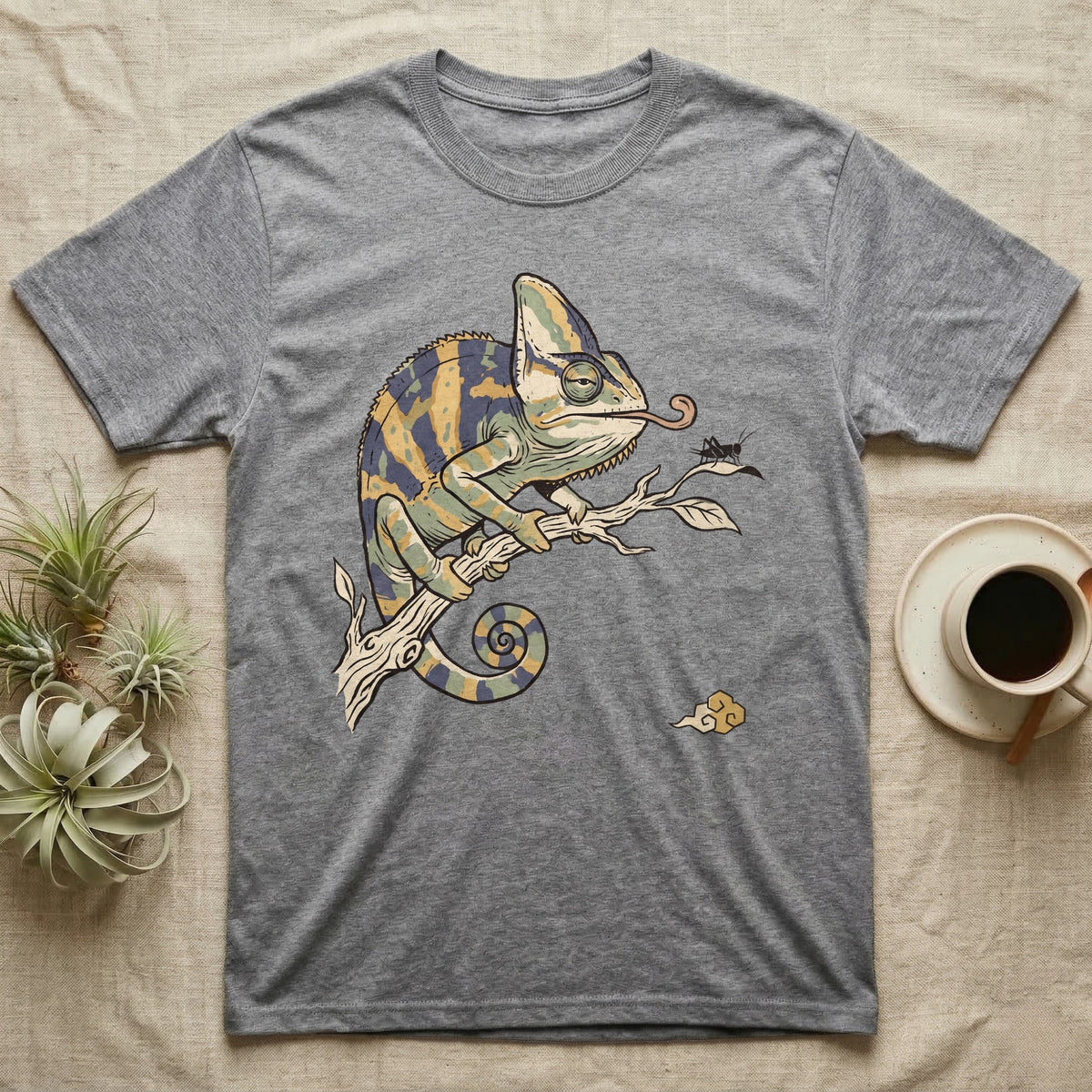 Veiled Chameleon Diet T-Shirt in Sport Grey — Ukiyo-e woodblock illustration of a veiled chameleon extending its tongue, with a deadpan serif caption beneath the subject.