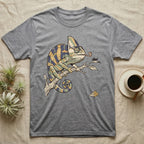 Veiled Chameleon Diet T-Shirt in Sport Grey — Ukiyo-e woodblock illustration of a veiled chameleon extending its tongue, with a deadpan serif caption beneath the subject.