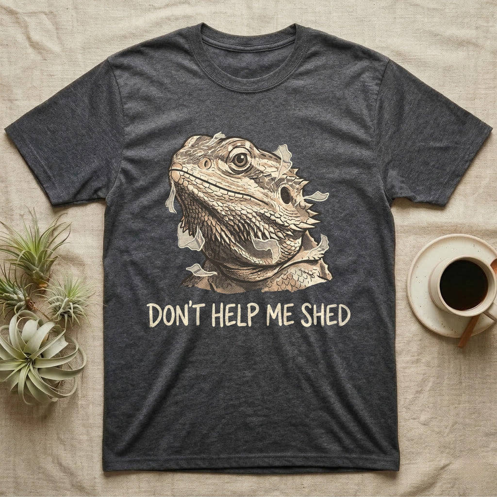 Don't Help Me Shed T-Shirt in Dark Heather — Retro-illustration of a bearded dragon mid-shed with a deadpan side-eye and a marker caption reading Don't Help Me Shed.