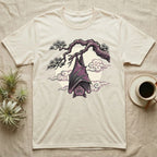 Cream t-shirt with a purple bat hanging upside down from a tree branch.