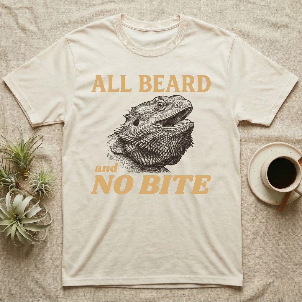 Bearded Dragon Bluff T-Shirt in Natural — Engraved bearded dragon with a puffed dark beard and open mouth under sand lettering reading ALL BEARD and NO BITE