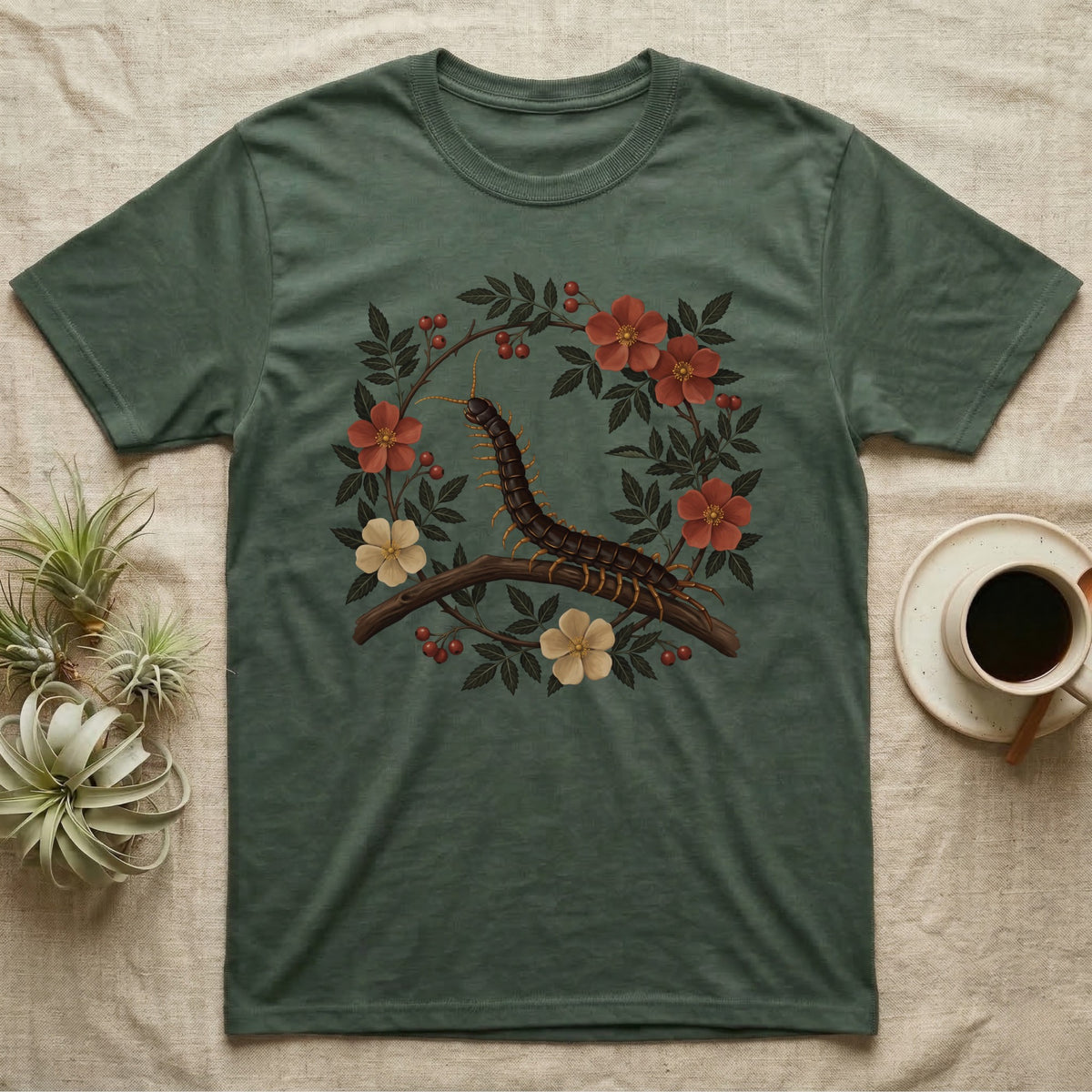 Vietnamese Centipede Botanical T-Shirt in Military Green — Vietnamese giant centipede painted in matte oil, in profile on a branch inside an oval bower of flowering bramble.