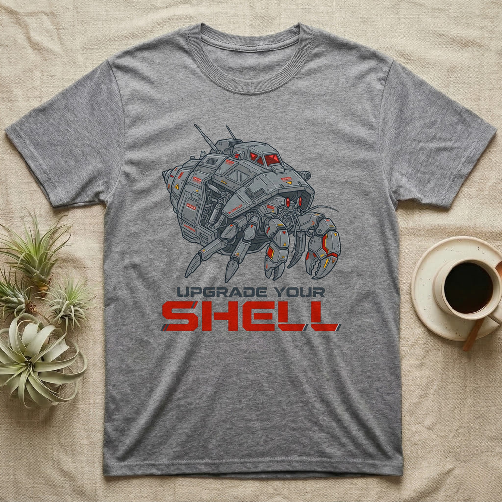 Gray t-shirt with graphic of a crab-like mechanical suit and text "UPGRADE YOUR SHELL".