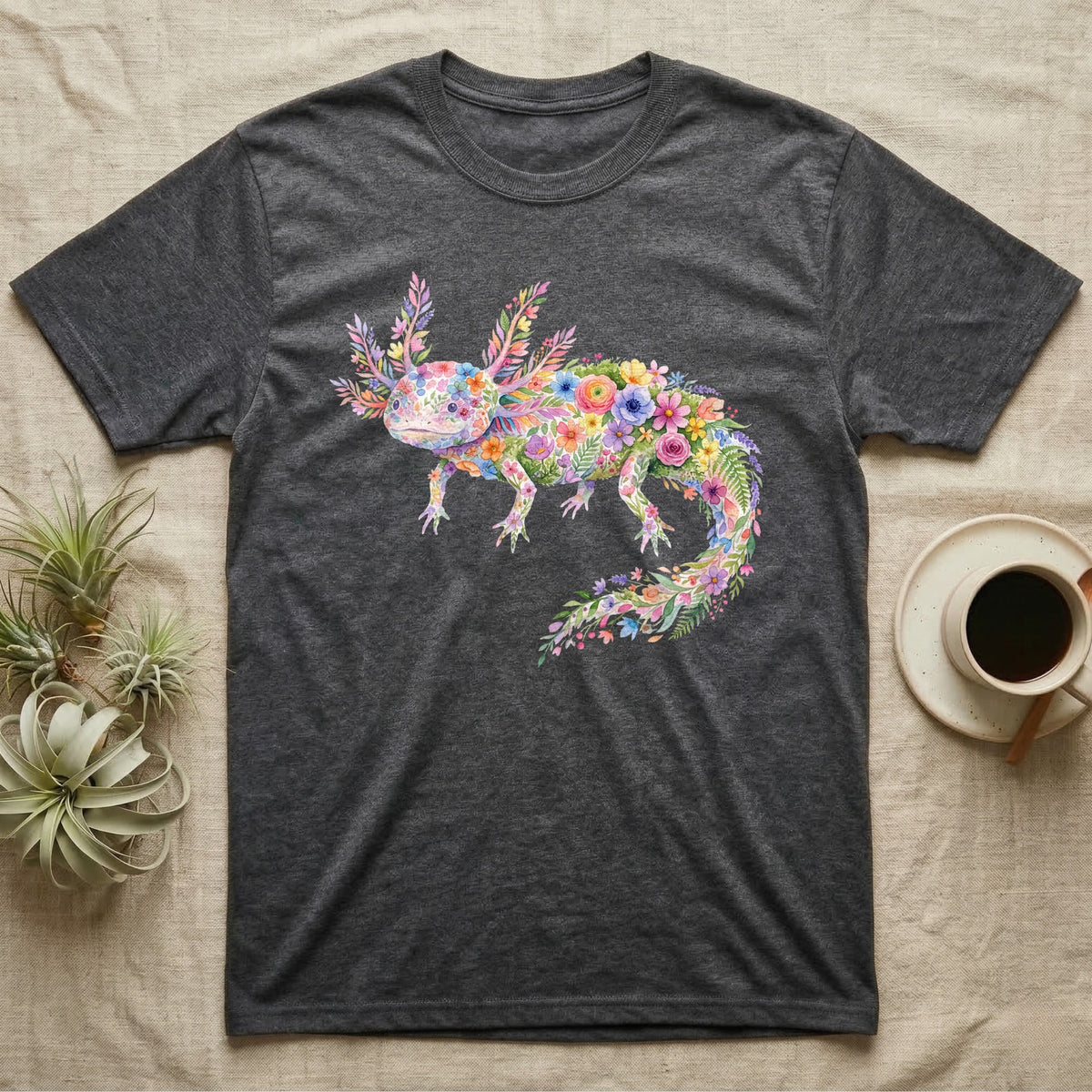 Axolotl Watercolour Mosaic T-Shirt in Dark Heather — Watercolour mosaic axolotl made of painted flowers and leaf blades, gill plumes fanned, petals trailing from its tail