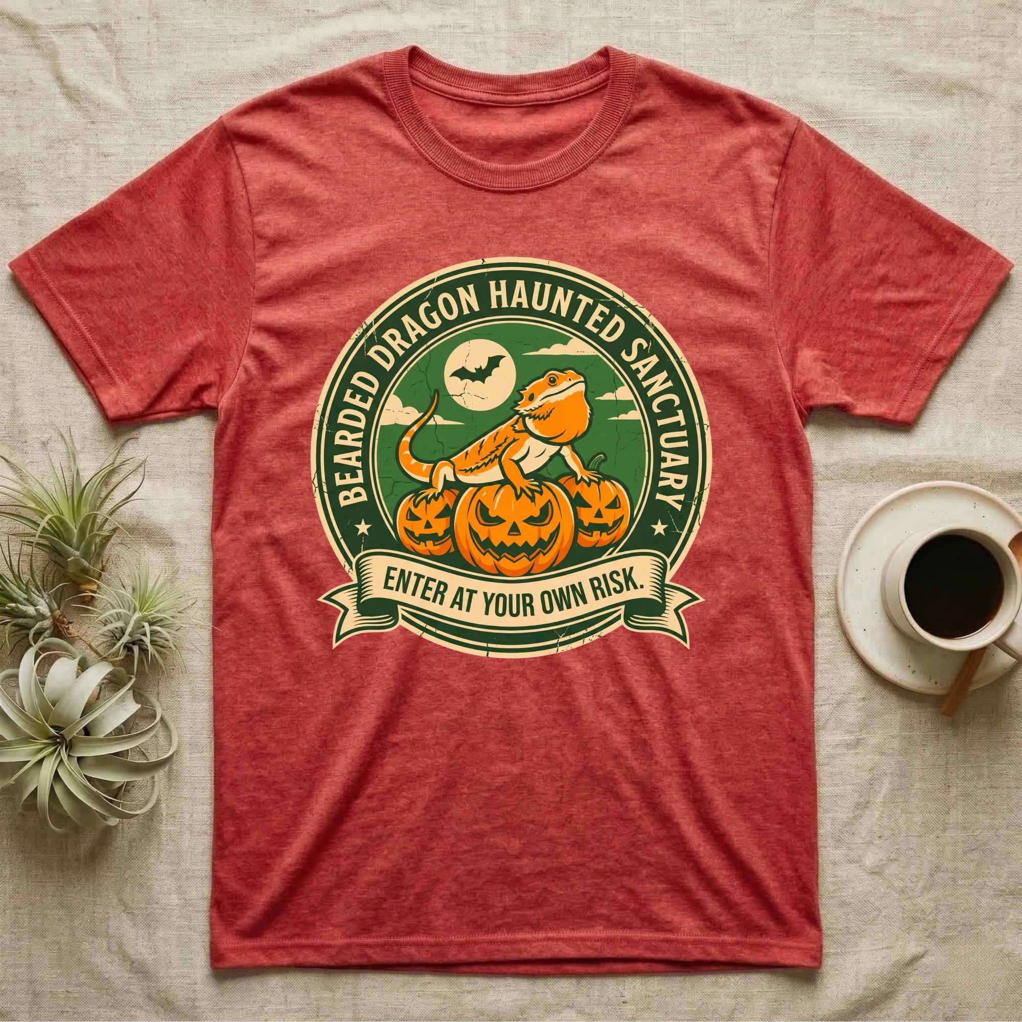 Bearded Dragon Haunted Sanctuary T-Shirt in Heather Red — Vintage badge of a bearded dragon on glowing pumpkins under a moon, "Bearded Dragon Haunted Sanctuary."