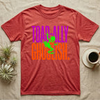 Tree Frog Toad-ally Ghoulish T-Shirt in Heather Red — Neon green tree frog with a pumpkin pail clinging across stacked text, "Toad-ally Ghoulish."