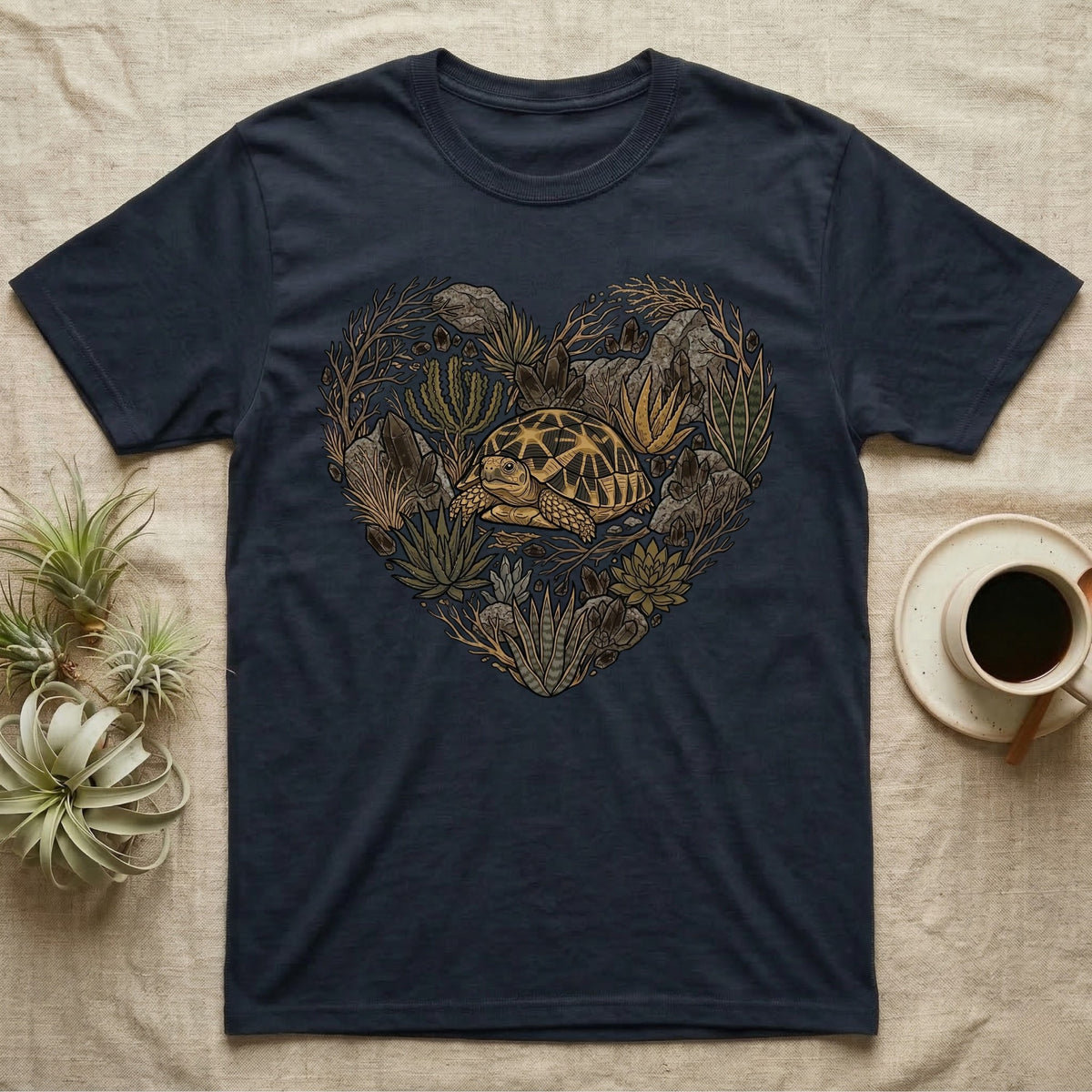 T-shirt with heart-shaped naturalistic design featuring a tortoise and foliage.