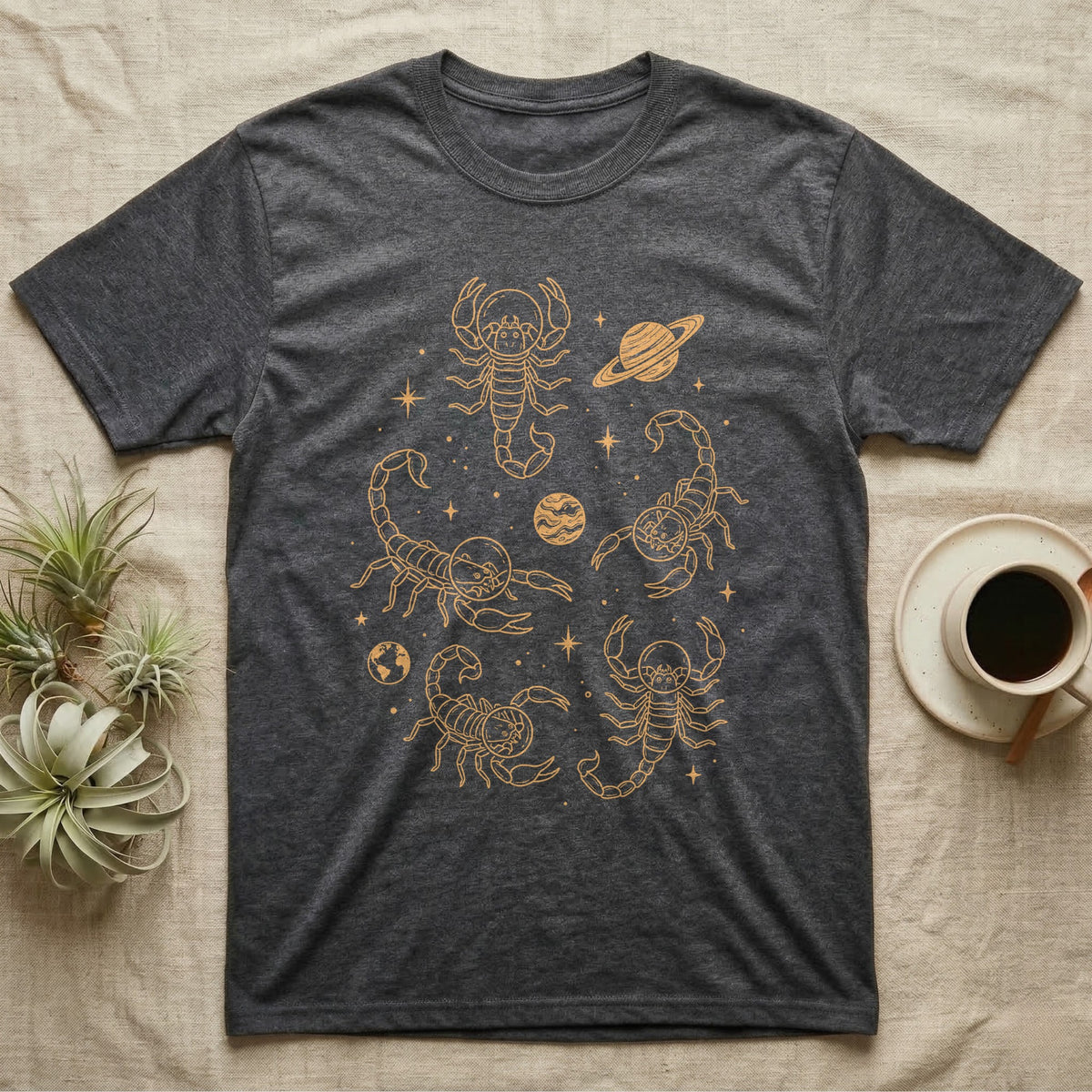 Scorpion Cosmic T-Shirt in Dark Heather — Vintage screen-print illustration of scorpions in astronaut helmets floating in space, cosmic amber monochromatic on dark background.