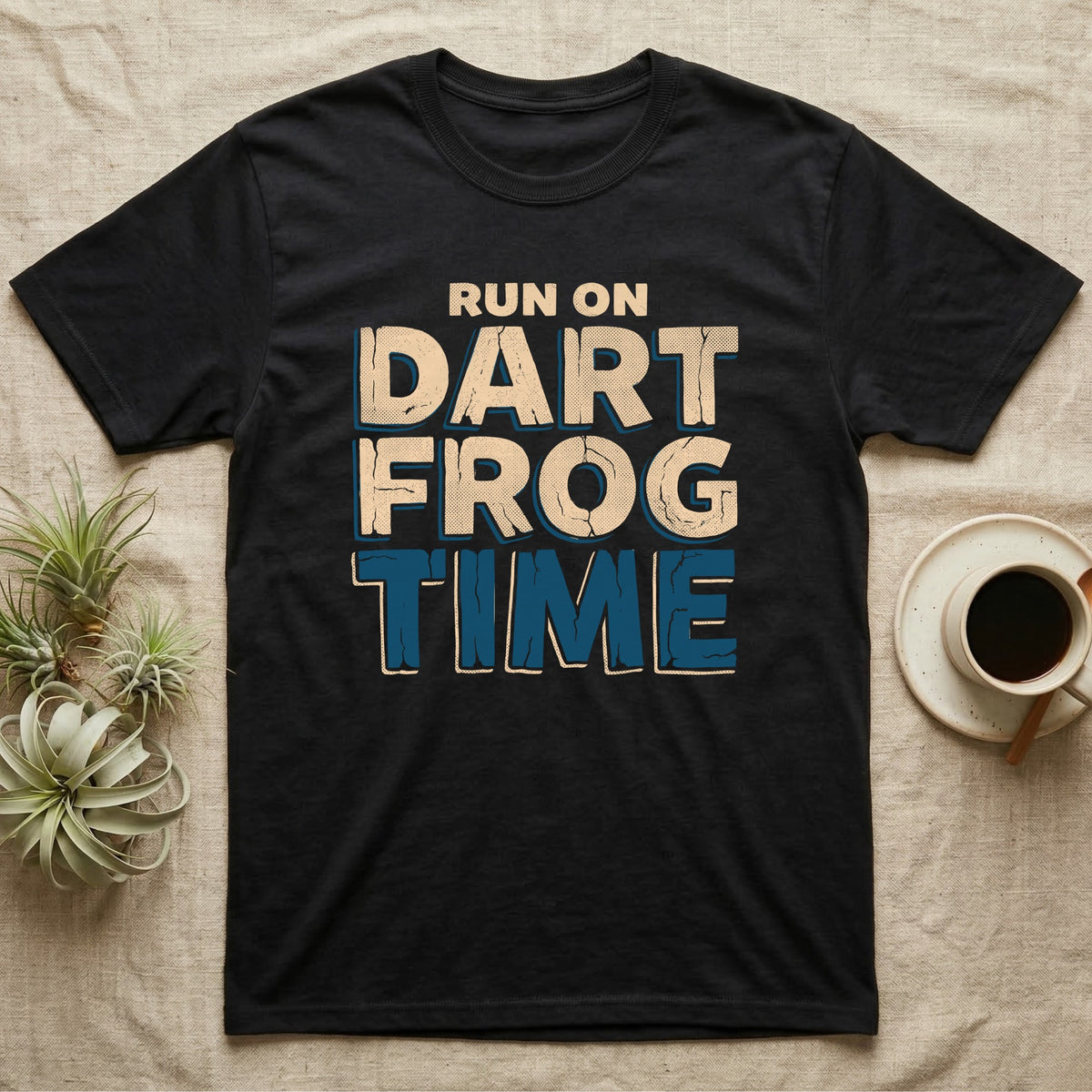 Dart Frog Time T-Shirt in Black — Distressed-block wordmark reading run on dart frog time in a bold two-tier chest lockup, text only.