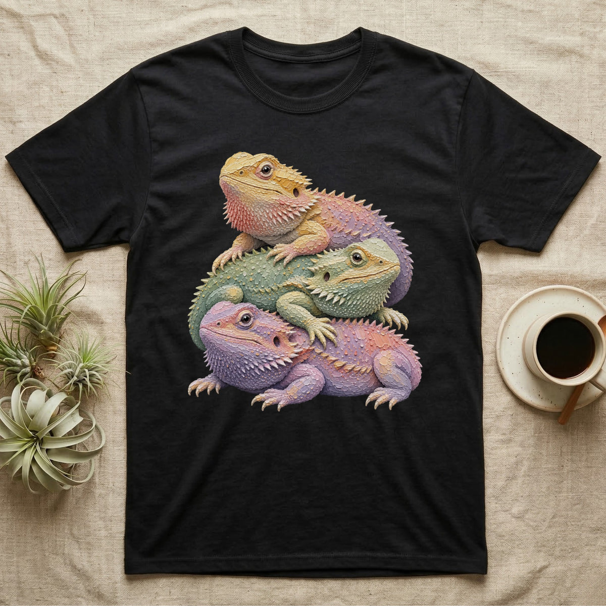 Black t-shirt featuring a stacked illustration of three colorful bearded dragons.