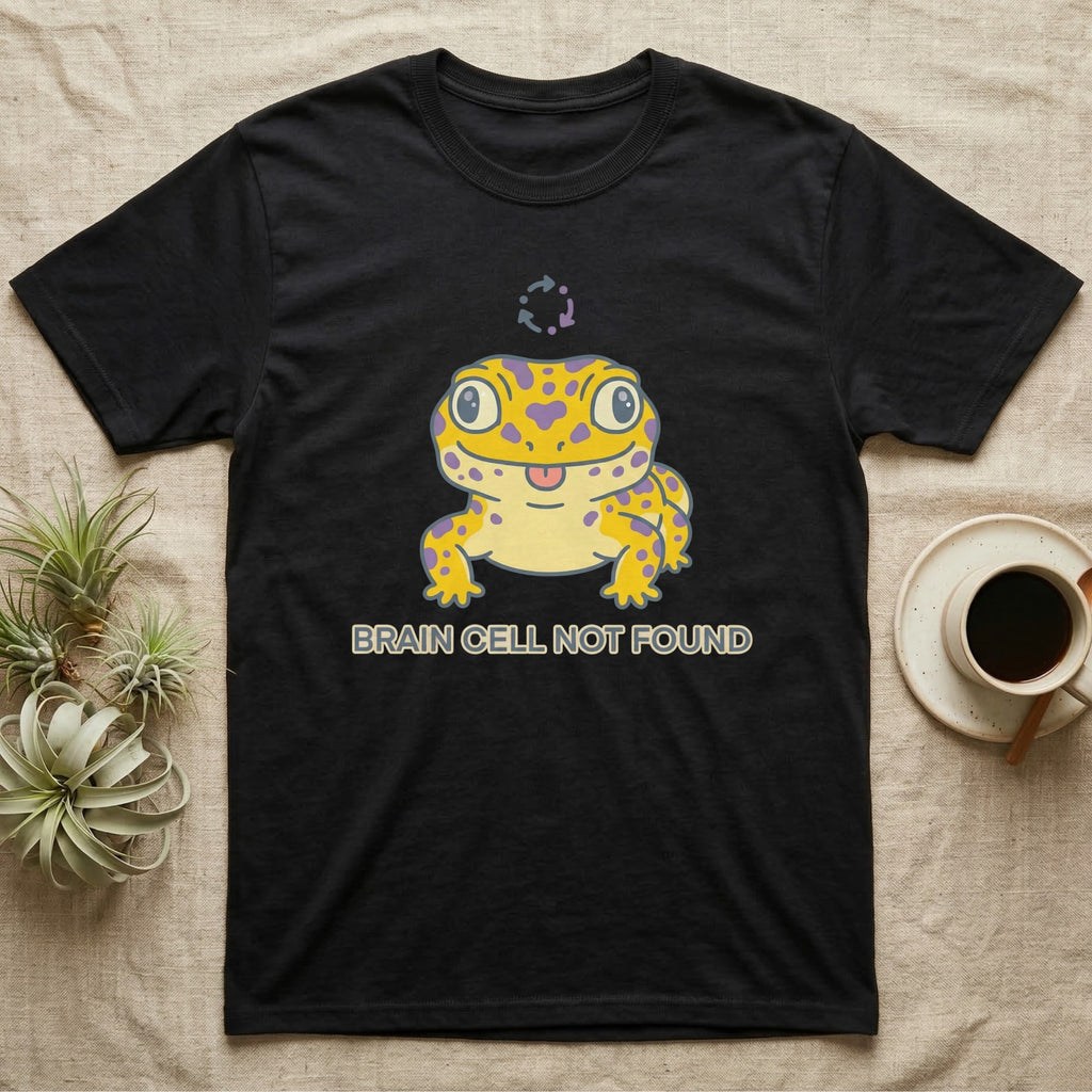 Black t-shirt with a cartoon gecko saying "BRAIN CELL NOT FOUND".