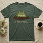 Green t-shirt with a cartoon frog emerging from the dirt, saying "I AM A ROCK."