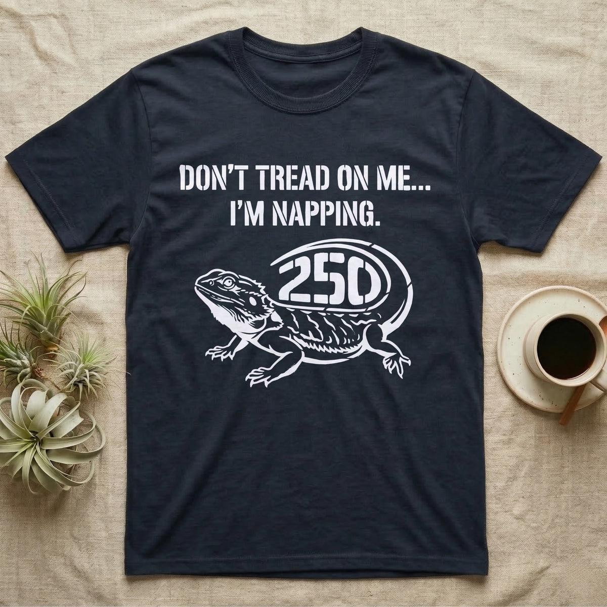 Bearded Dragon Napping T-Shirt in Navy — White stencil bearded dragon resting with 250 cut into the tail under text Don't Tread On Me, I'm Napping.