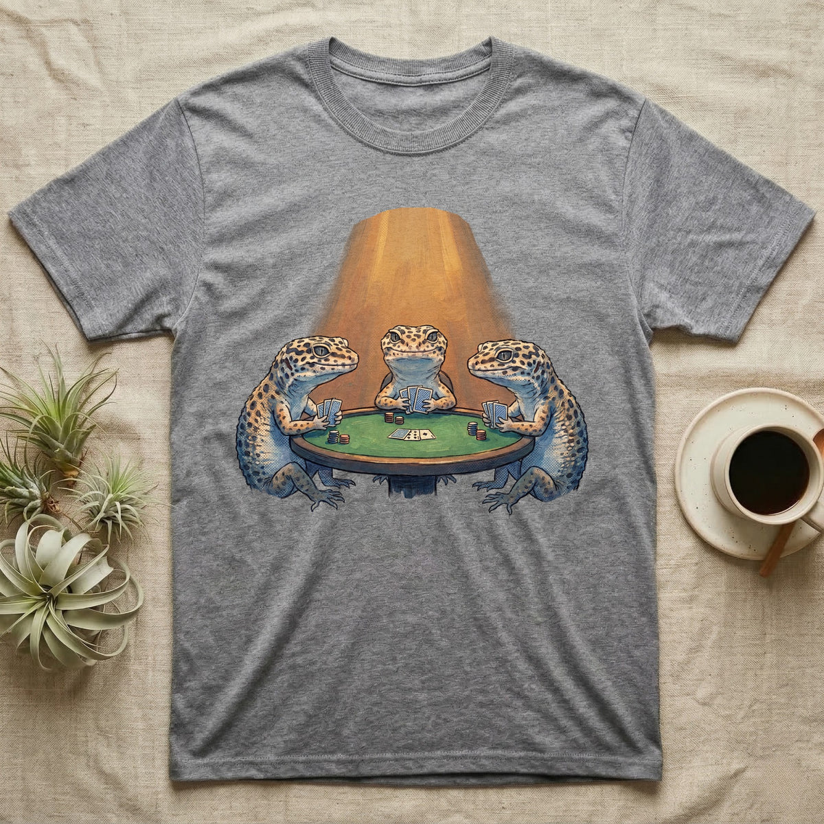 Leopard Gecko Poker T-Shirt in Sport Grey — Vintage oil-painting tableau of three leopard geckos playing poker around a green-felt table in warm amber light.