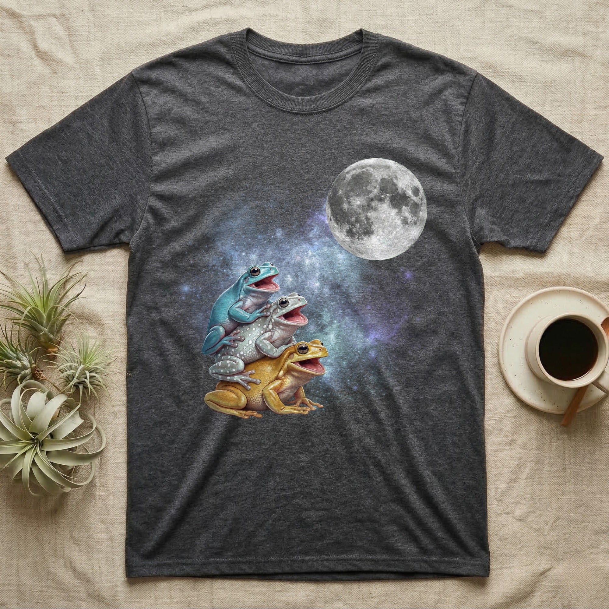 White's Tree Frog Moon Howl T-Shirt in Dark Heather — Three White's Tree Frog colour morphs howling at a full moon over a nebula on a dark grey t-shirt.