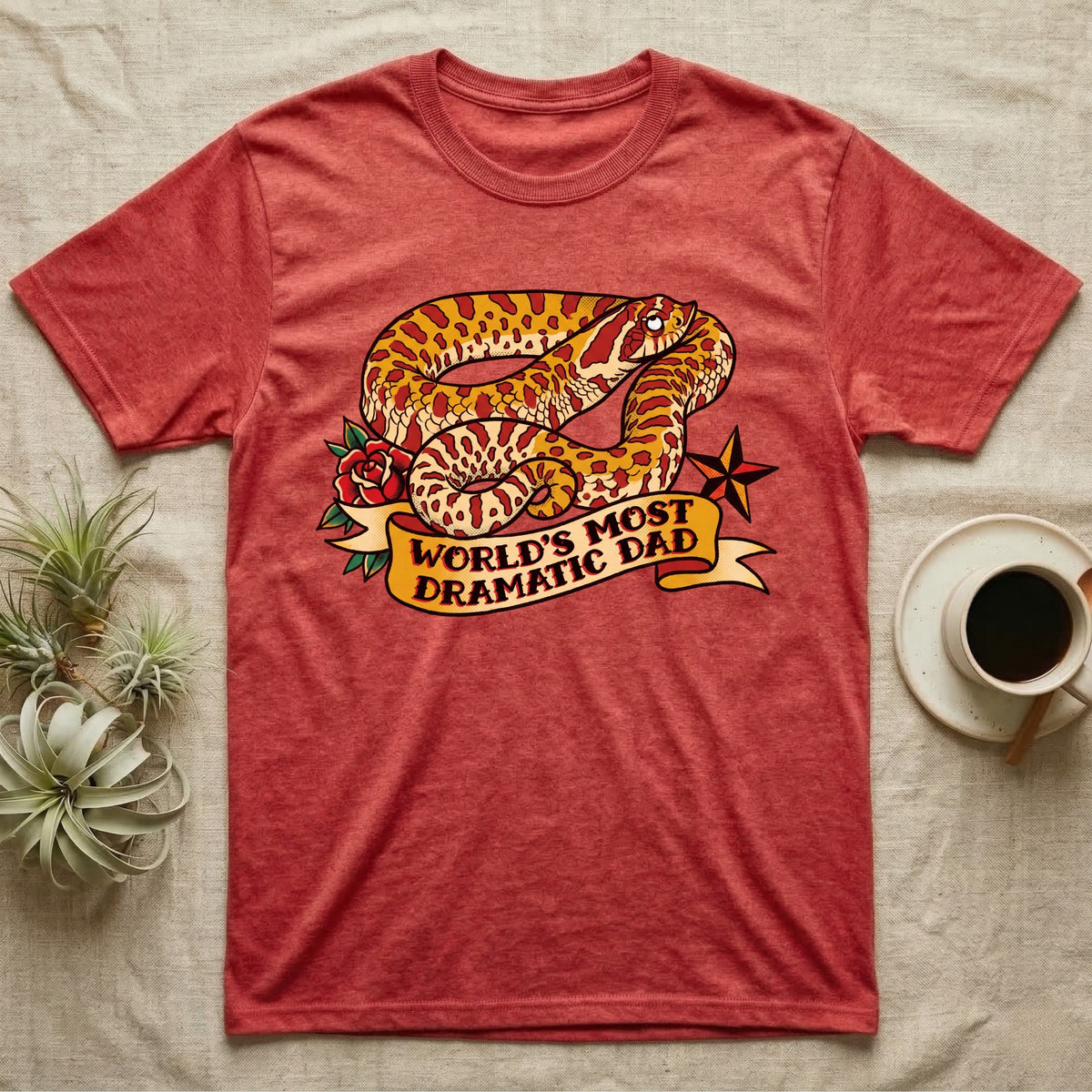 Dramatic Dad Hognose T-Shirt in Heather Red — Tattoo-flash illustration of a hognose snake mid-dramatic-flop with a banner reading World's Most Dramatic Dad.
